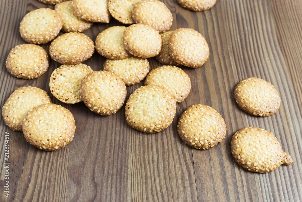 sweet sesame biscuits on a wooden table sweet sesame biscuits on a wooden table