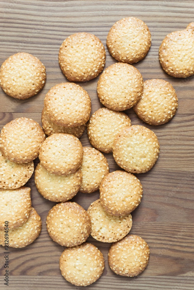 sweet sesame biscuits on a wooden table sweet sesame biscuits on a wooden table