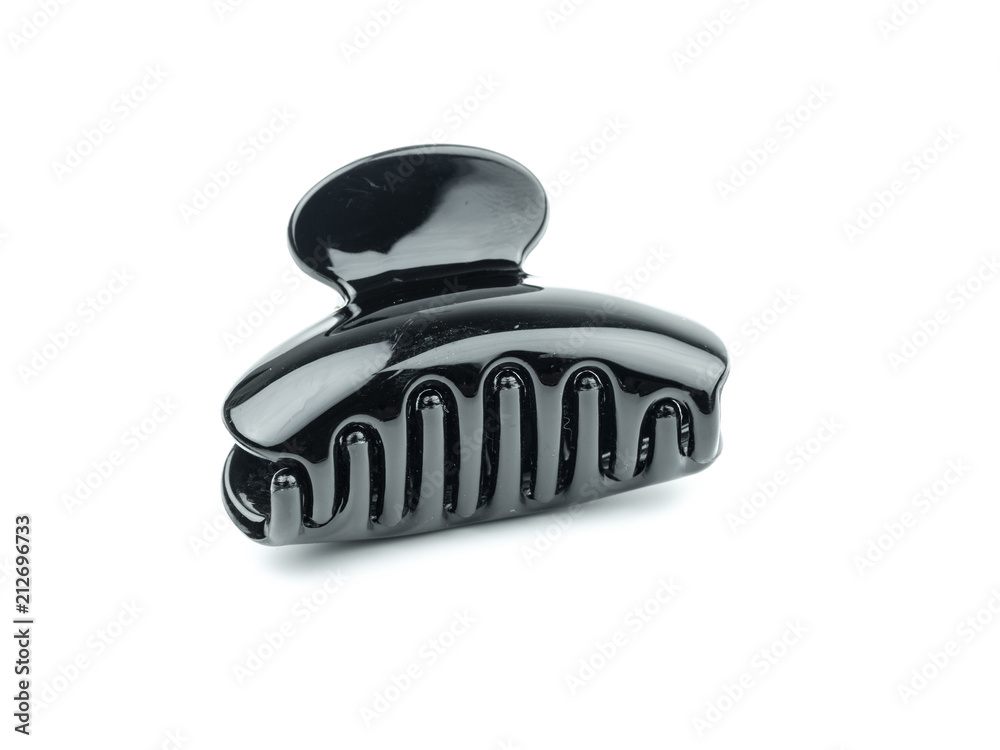 Plastic Hair Clip taken closeup and isolated on white background Plastic Hair Clip taken closeup and isolated on white background