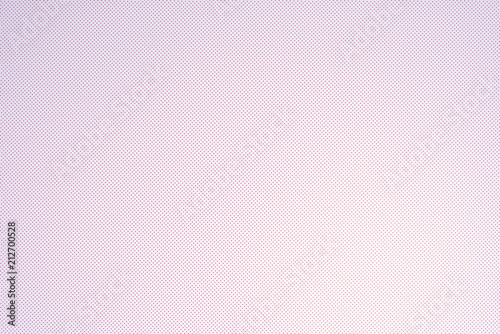 top view of white template with tiny red polka dot pattern for background