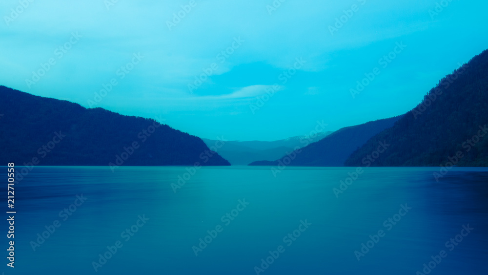 Lakes and mountains in blue tones