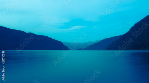 Lakes and mountains in blue tones