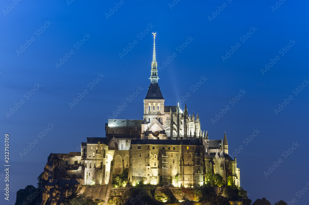 Saint Michel famous castle with water reflection. France