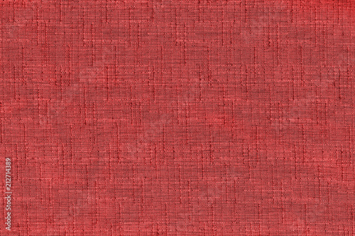 Red fabric texture background. Empty abstract cloth backdrop
