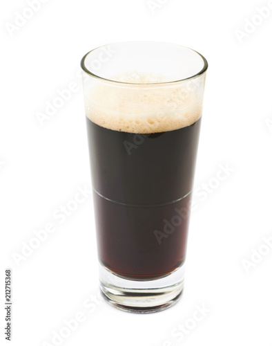 Glass of dark beer isolated