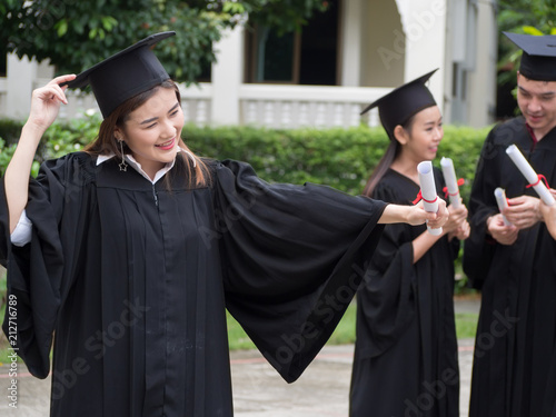 Graduation Friend Achievement Celebrate Degree Concept.Beautiful Asian university graduates celebrate their success.