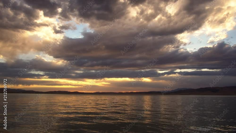 Sunset time lapse over Utah Lake on colorful summer night. Sunset time lapse over Utah Lake on colorful summer night.