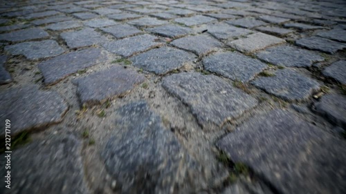 Floating over cobblestone photo