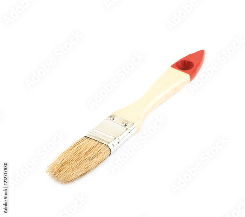 Wide wooden paint brush isolated