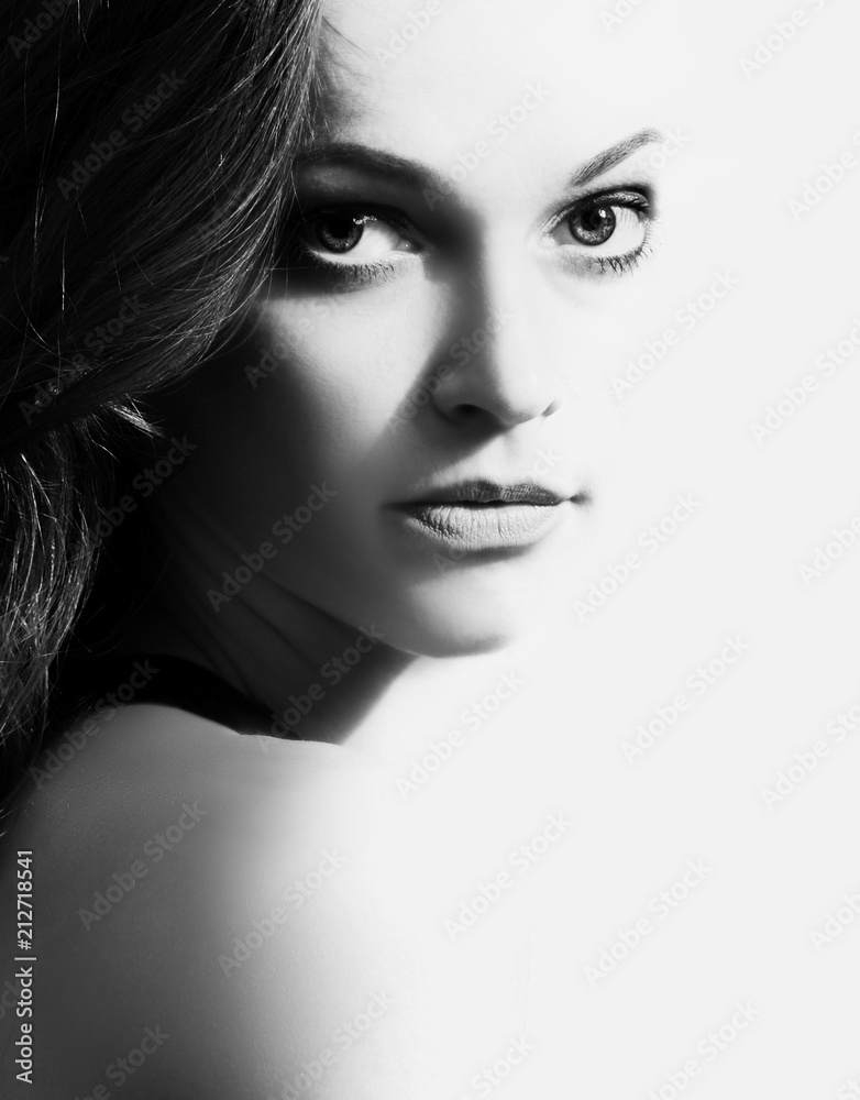 Fototapeta premium Beautiful woman face close up studio shot.