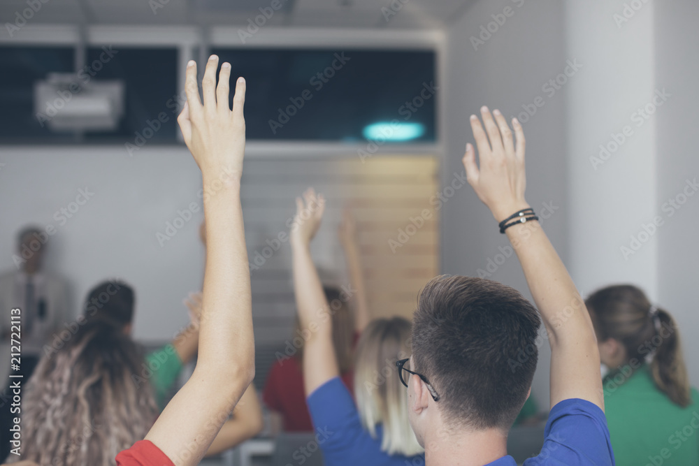 High School Students Sitting Rising Hands High School Students Sitting Rising Hands