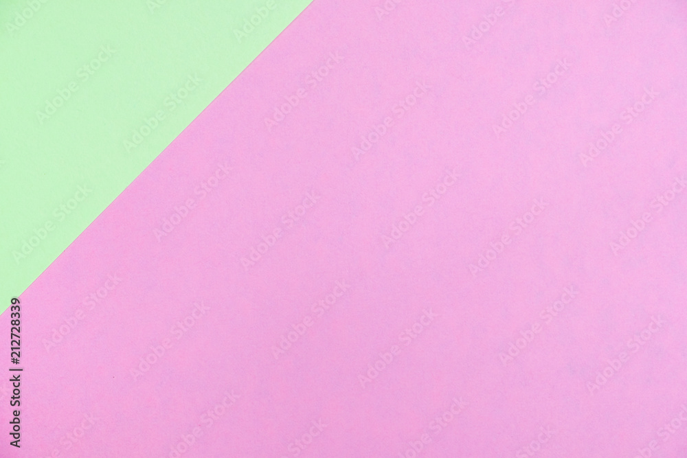 Pastel colored paper flat lay top view, background texture, green and pink Pastel colored paper flat lay top view, background texture, green and pink