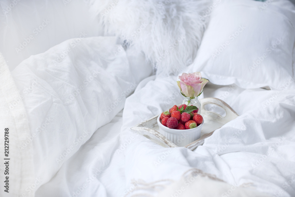 Breakfast in bed and flowers, romance and good morning. Copy space. Breakfast in bed and flowers, romance and good morning. Copy space.