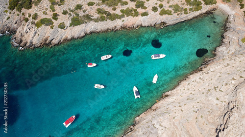 Photography Aerial photo of tropical rocky seascape with beutiful turquoise clear sea and bo
