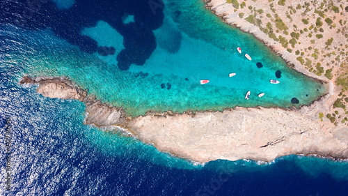 Photography Aerial photo of tropical rocky seascape with beutiful turquoise clear sea and bo