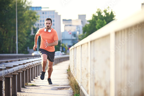 Fototapeta Naklejka Na Ścianę i Meble -  Man is jogging