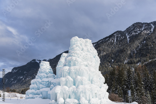 Waterfall frozen in the Italy, Dolomites Mountains photo