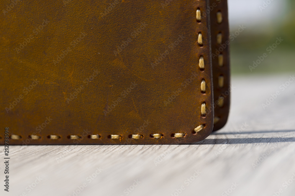 Leather Wallet on wooden table