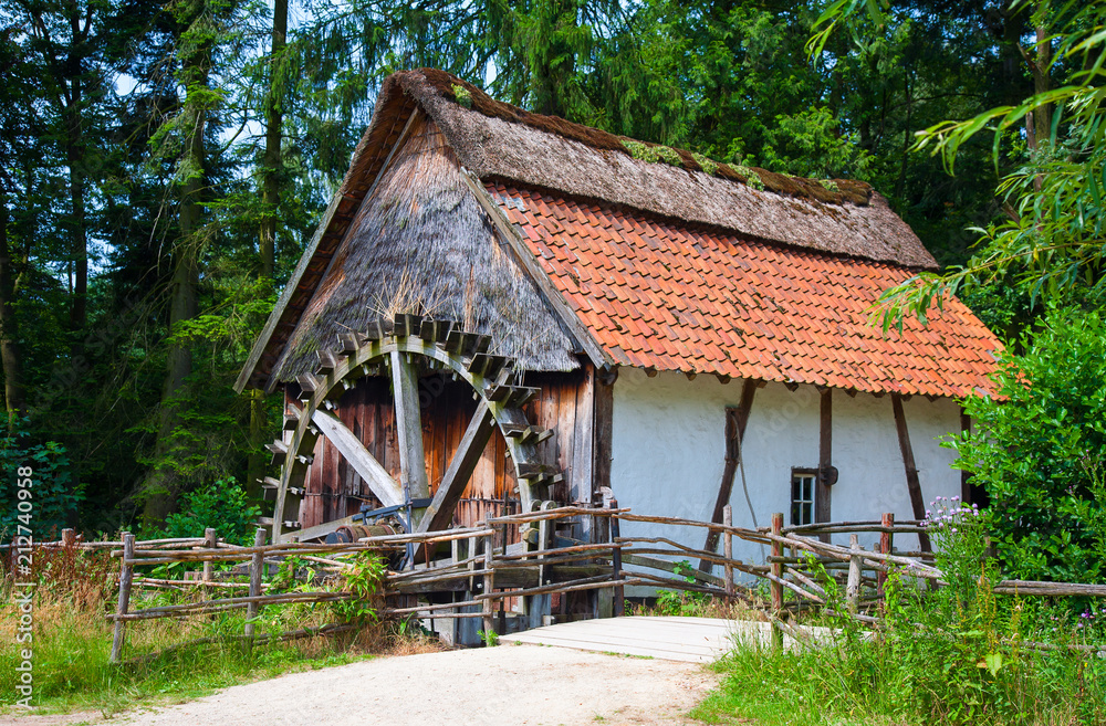 Old timber-framed house with watermill Old timber-framed house with watermill