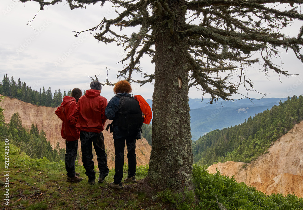 Naklejka premium People hiking at the Rusty Pit, Romania