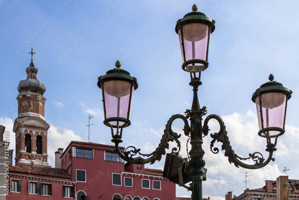 Street lamp and old hotel In Venice