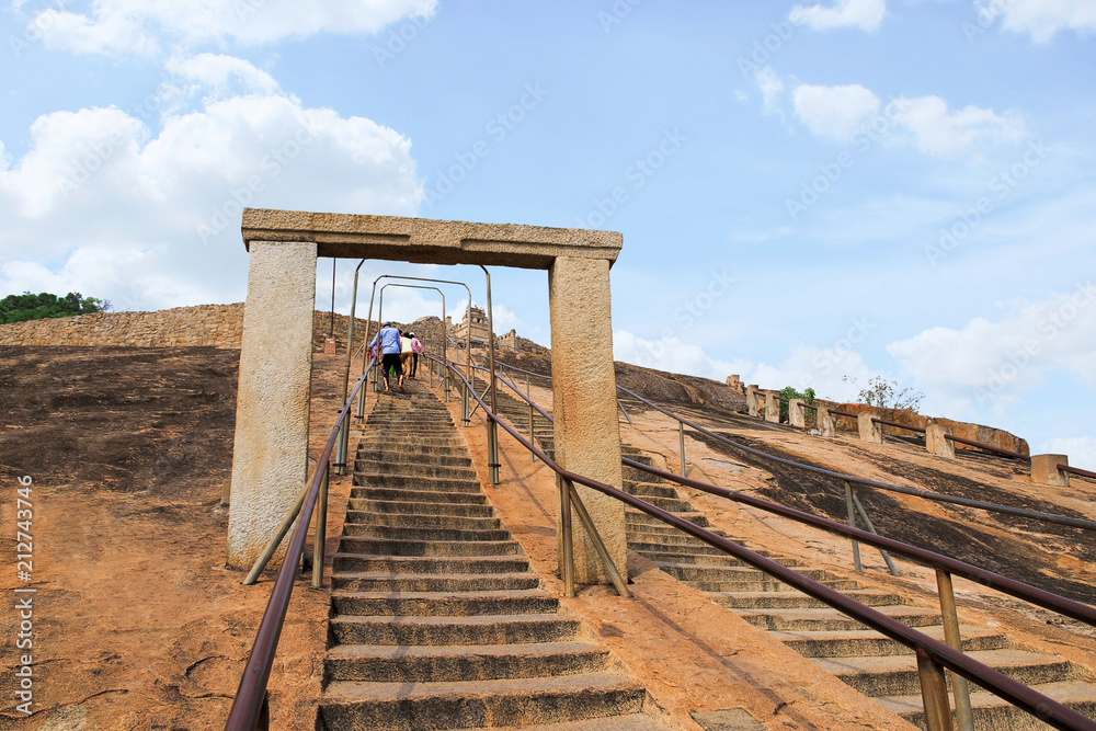 Gateway and rock cut steps leading to the Gomateshwara temple, Vindhyagiri Hill, Shravanbelgola, Karnataka Gateway and rock cut steps leading to the Gomateshwara temple, Vindhyagiri Hill, Shravanbelgola, Karnataka