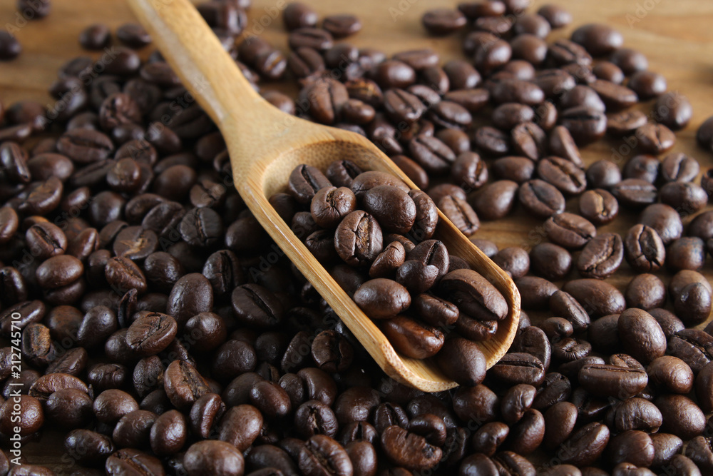Fototapeta premium background of coffee and spoon wooden background