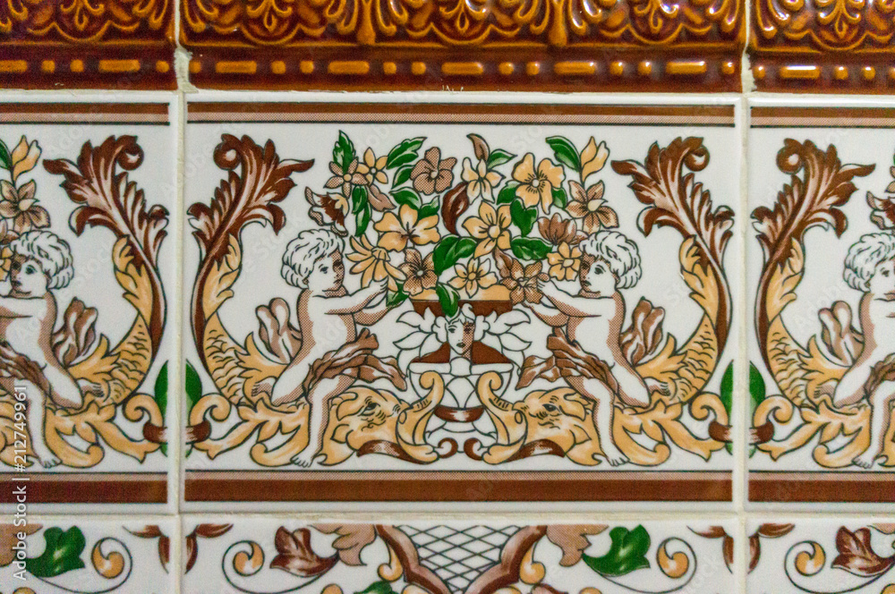 Typical decoration of the facade of the house in Lisbon. Traditional ceramic tiles Azulejos
