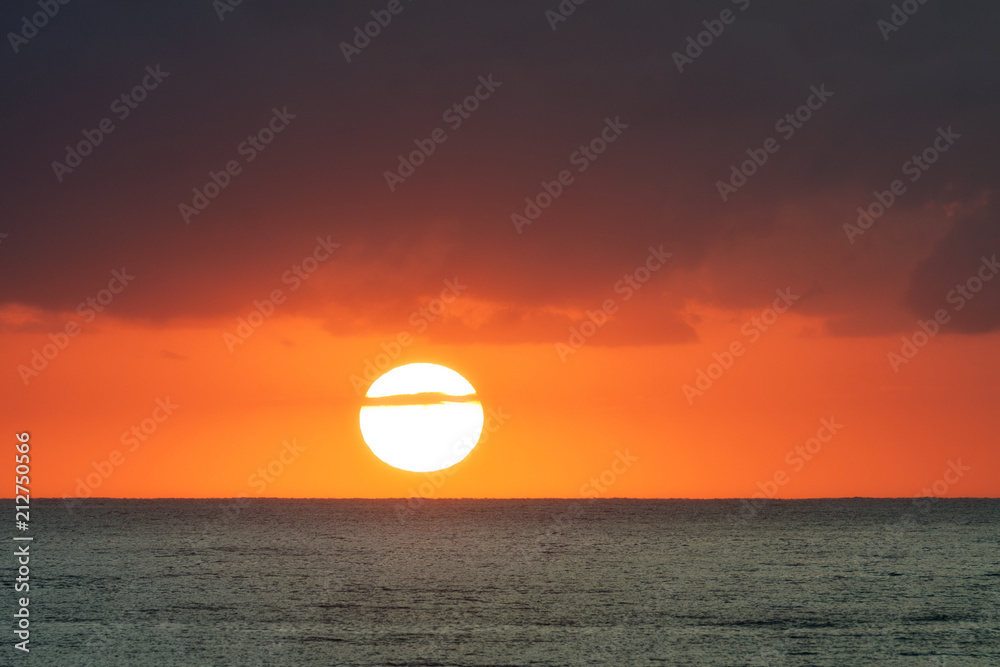 Sunrise over the ocean with orange sky and clouds, Gold Coast, Australia