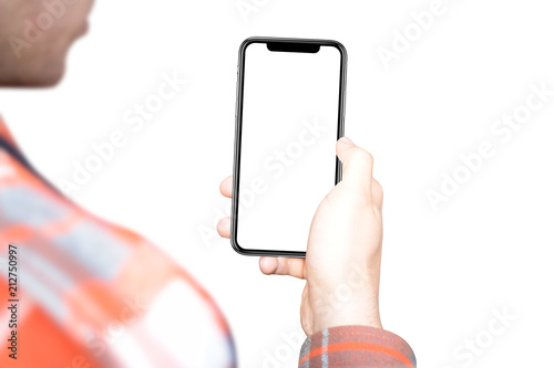 Man using a black smartphone with a white isolated screen for product or app mockup. White background