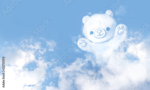 Teddy bear-shaped clouds on blue sky background.