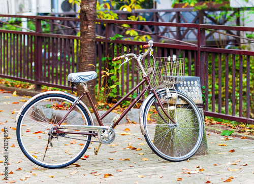Brown bicycle on the city street, Kyoto in Japan. Copy space for text.