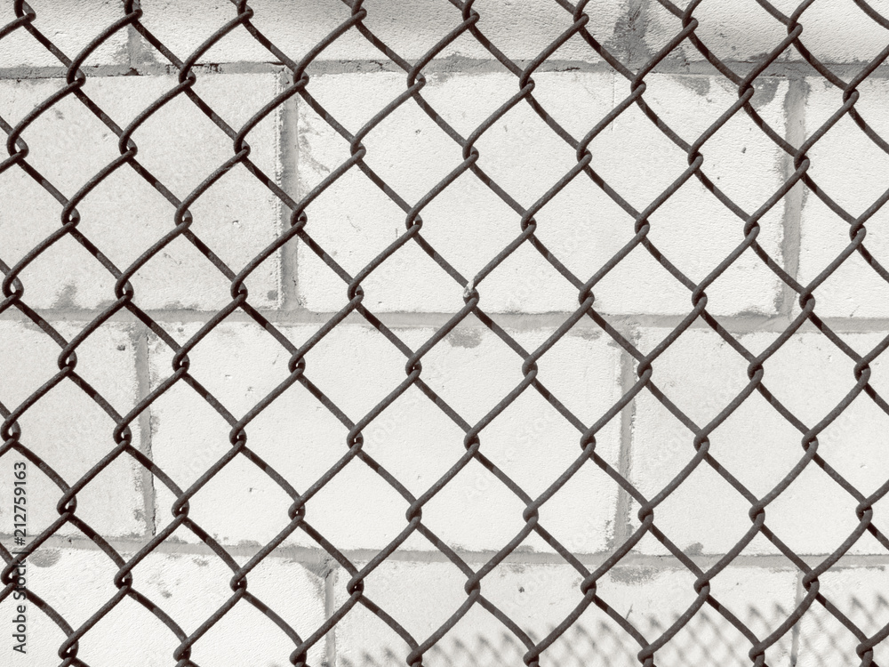 metal lattice and brick white wall background metal lattice and brick white wall background