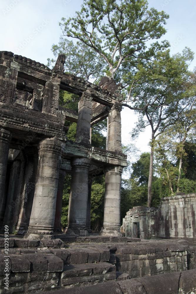 Angkor Cambodia, ruins of a two storey building with columns at the 12th century Preah Khan temple complex
