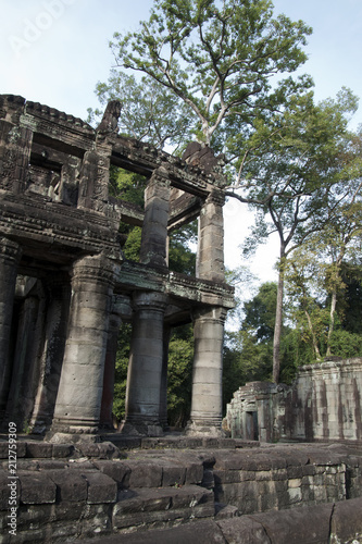 Angkor Cambodia, ruins of a two storey building with columns at the 12th century Preah Khan temple complex © KarinD