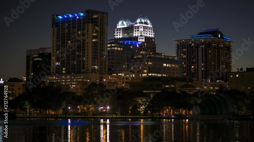 Orlando Downtown Lake Eola buildings reflection at night.