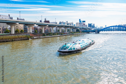 Photography TOKYO, JAPAN - OCTOBER 31, 2017: Pleasure boat on the Sumida river