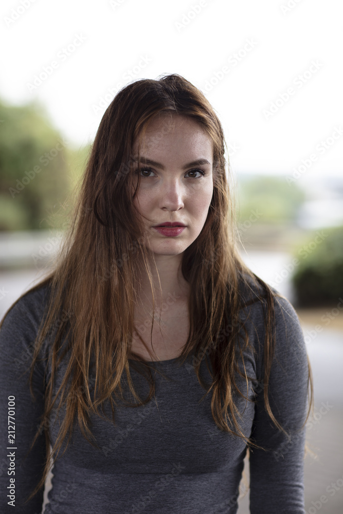 Portrait of a Pretty Woman Looking at the Camera With Intensity Portrait of a Pretty Woman Looking at the Camera With Intensity