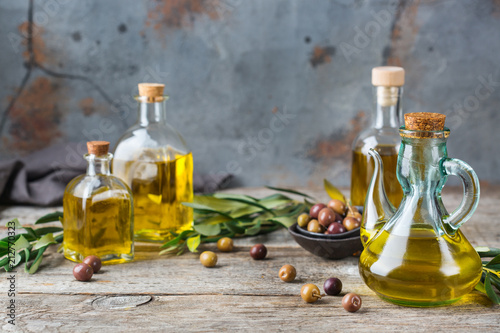 Obraz na plátne Assortment of fresh organic extra virgin olive oil in bottles