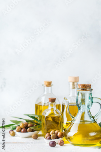 Assortment of fresh organic extra virgin olive oil in bottles Fototapet