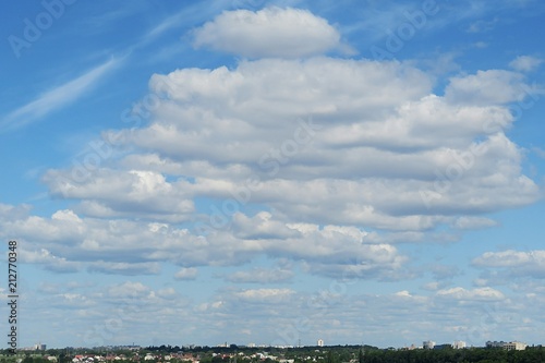 Beautiful sky view with big fluffy clouds, natural background 