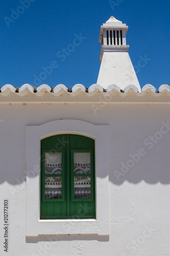 Portuguese architecture with traditional chimney photo