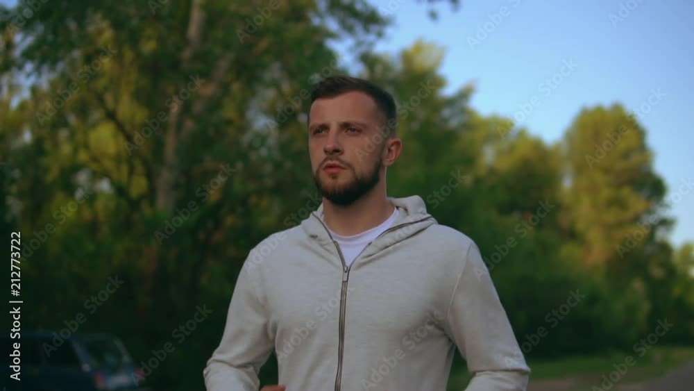 Man is training hard to keep himself fit. Guy is looking healthy and strong. Man is training hard to keep himself fit. Guy is looking healthy and strong.