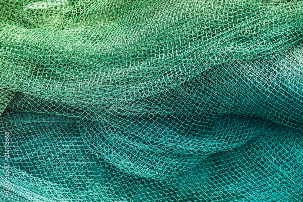 Blue and green fishing nets - obrazy, fototapety, plakaty 