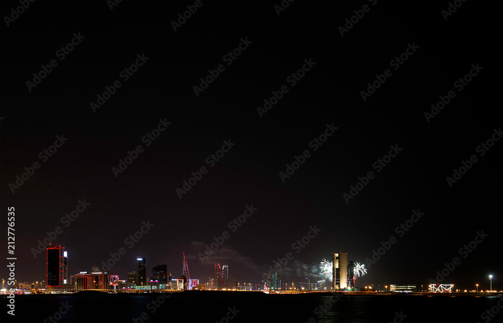 Fireworks at Bahrain Skyline and iconic building on  Bahrain National Day