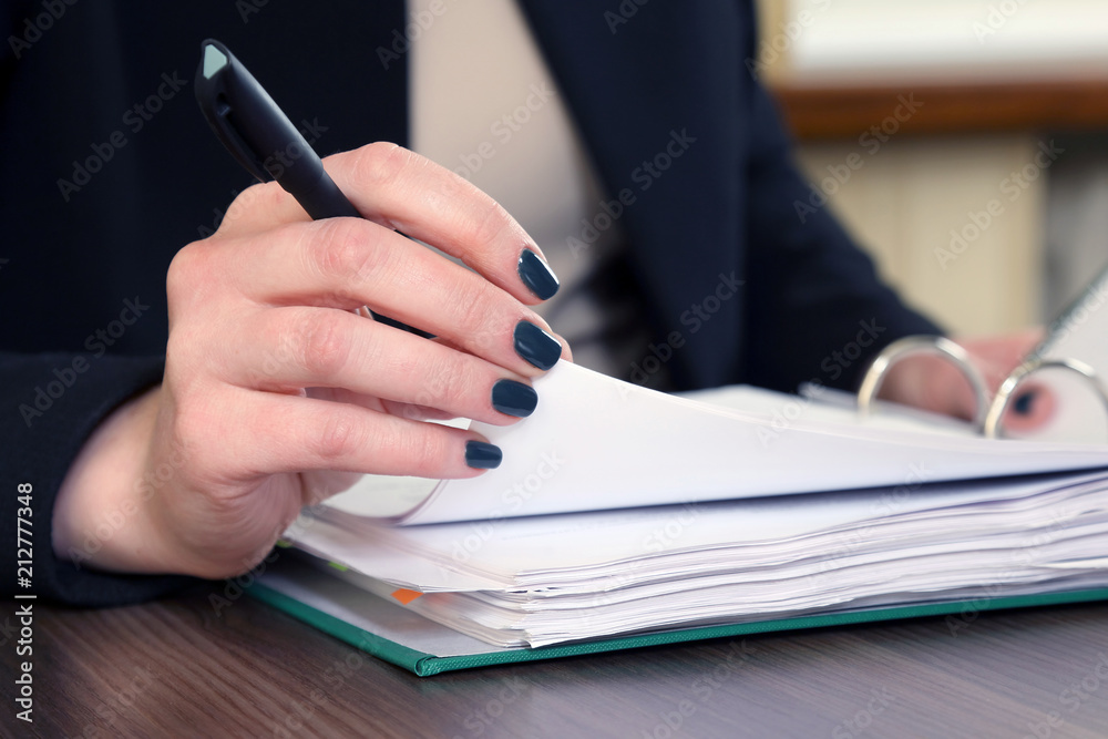 hand of business woman with document viewer hand of business woman with document viewer