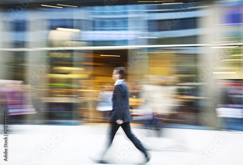 Man walking in the city, motion blur