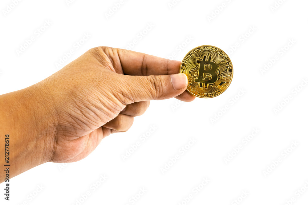 Bitcoins in the hand of man isolated Bitcoins in the hand of man isolated