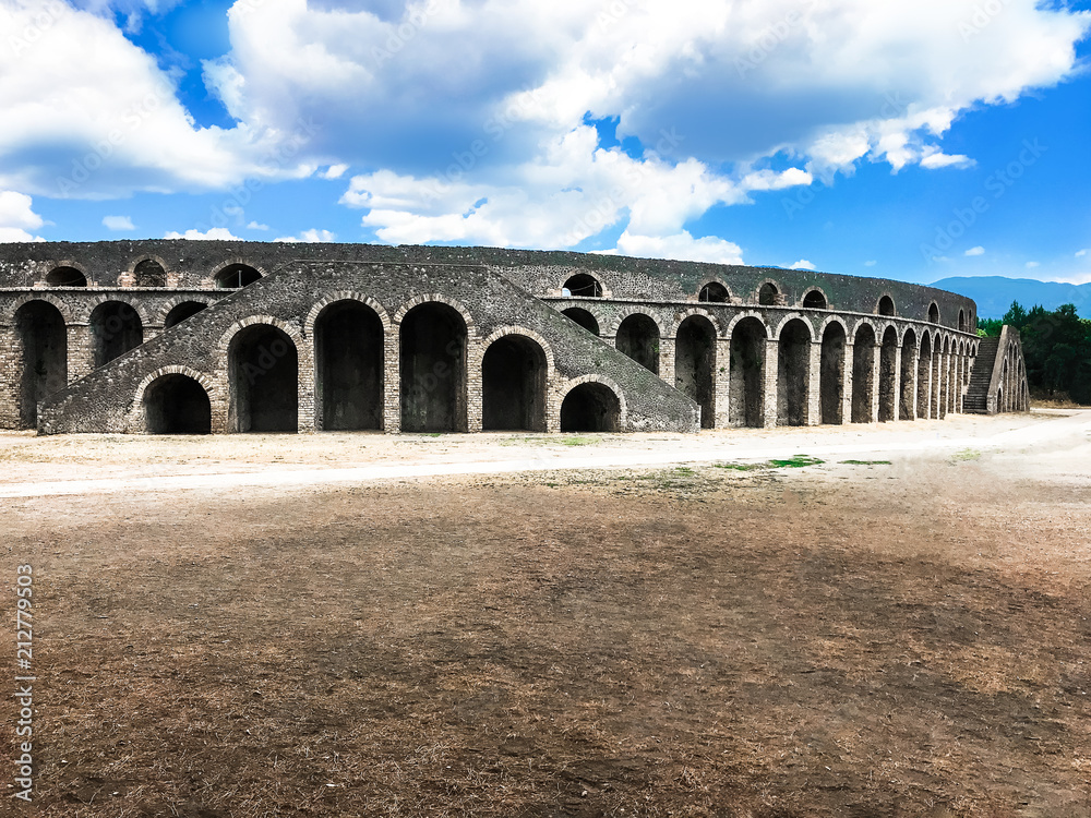 Quarantine. Empty Ancient Roman city of Pompeii under a blue sky with clouds