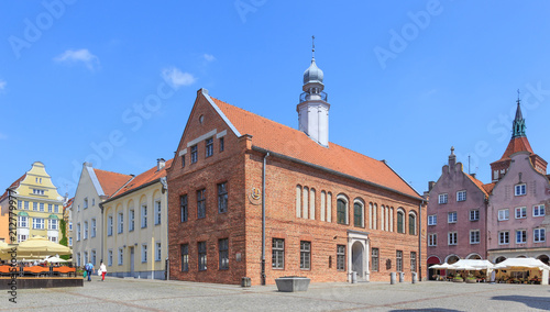 Olsztyn, Poland - Late gothic Old Town Hall on Old Town Market Square. There are sundials on walls